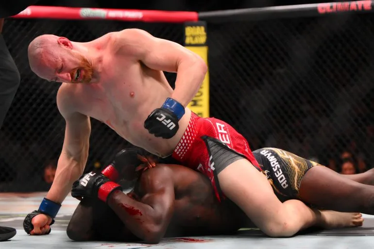 Israel Adesanya's Redemption Bid Falls Short with TKO Loss Extending Fourth Consecutive Defeat