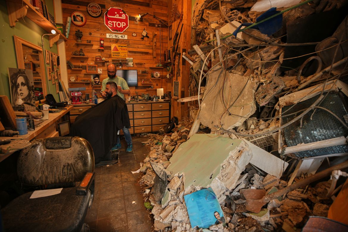 Thousands of displaced Lebanese families cautiously return home despite ongoing war fears.