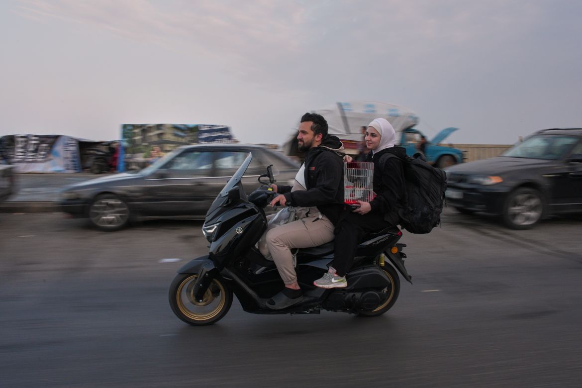 Thousands of displaced Lebanese families cautiously return home despite ongoing war fears.